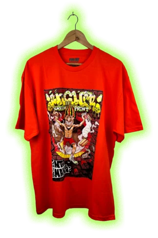 Camiseta naranja PIBES CHORROS «Tinta en las Manos» de ANKOR, ilustración de Senk, vista frontal