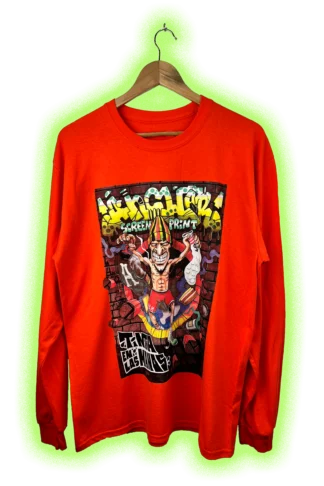 Camiseta de manga larga naranja PIBES CHORROS «Tinta en las Manos» de ANKOR, ilustración de Senk, vista frontal